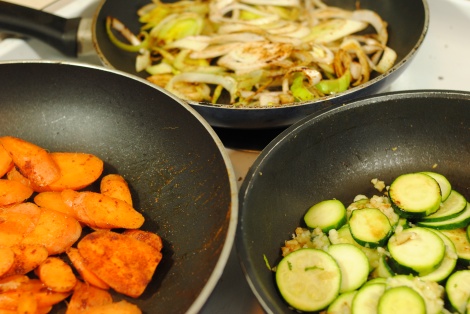 Carrots, Leek, and Zucchini cooking in separate pans for frittata (photo)
